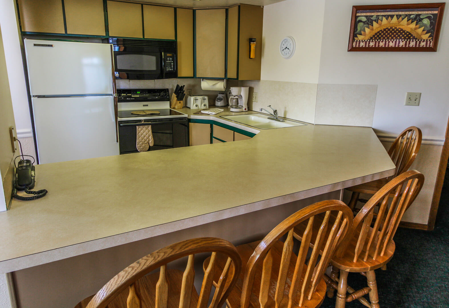 A fully equipped kitchen at VRI's Wolf Creek Village I in Eden, Utah.